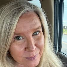 Oatman shop with 2 front doors and flags for sale