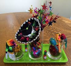 Cinco De Mayo Centerpieces Trays Glassware Are From Dollar Tree As Are Metallic Bows In S Mexican Theme Party Decorations Mexican Party Theme Fiesta Party