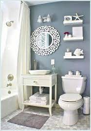 Fresh, cooling hues, inspired by sandy beaches and azure waters, complements the creamy beige floor and tub. Ocean Themed Bathroom Decor Ideas Nautical Bathroom Decor Beach Theme Bathroom Ocean Themed Bathroom Decor