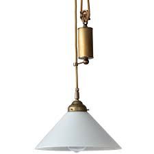 Pull down lighting can also be effective either side of. Nostalgic Rise Fall Pendant Light With Conic Glass Shade Casa Lumi