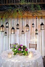 Erin And Tanner S Wedding In Koloa Hawaii Lantern Decor Wedding Head Table Backdrop Wedding Lanterns
