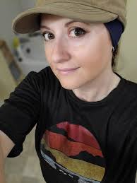 How do people use hats, hoods, and sunglasses to limit their eyesight and  reduce sensory overload?