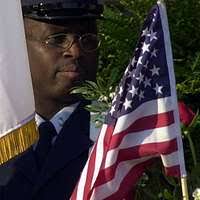 Commodore Grace M. Hopper, special assistant to the commander, Naval Data  Automation Command (right), poses beside Eva M. Sebastion, project manager  of the Navy Regional Data Automation Center, San Diego, during the