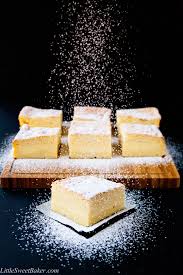 Lightly coat a 13x9 baking dish with nonstick spray, then line with do ahead: Vanilla Bean Magic Cake Little Sweet Baker