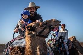 Save a cowboy, ride a camel. Desert Palm Grove Camel Ride From Marrakech With Tea Snack 2021
