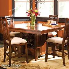 White and brown dining table with wine storage and two drawers. Dining Table With Wine Storage Ideas On Foter