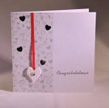 With a utility knife, cut 2 slits wide enough for ribbon in the fold, 1 inch from each edge. 20 Engagement Cards Ideas Engagement Cards Cards Wedding Anniversary Cards
