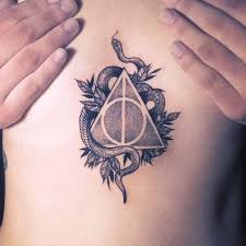 Pointing to something that looked like a whitened circle with lightning bolts escaping from it over his heart, harry said, the circle is from slytherin's locket, and the lightning bolts are from the killing curse. Harry Potter Slytherin Tattoo Slytherin Tattoo Harry Tattoos Harry Potter Tattoos