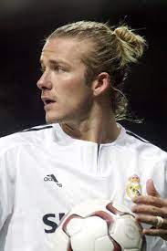 This is david beckham in real madrid! David Beckham Man Bun Hairstyle Picture With Real Madrid
