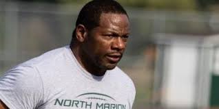 Griggs moves from Oregon to take over John Glenn football