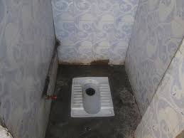 People don't use this road very often. How To Use The Indian Squat Toilet