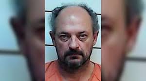 Man charged in death of wife, whose skull was found