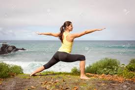 Maybe you would like to learn more about one of these? Young Woman Practicing Yoga Warrior Pose Near The Ocean Stock Photo Picture And Royalty Free Image Image 25585522