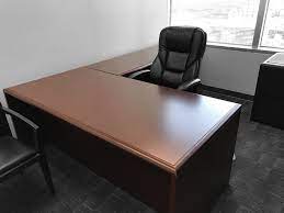 This desk is 66w x 30d with a 48l x 24d return and mahogany in color, it has 1 box/box/file and 1 file/file ped. Pre Own Mahogany L Shaped Mahogany Desk Orlando Desks At Office Liquidation