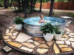 Our 8 Ft Galvanized Stock Tank Pool Has Been Perfect For Cooling Off On Hot Texas Summer Days Money And Time Wel Stock Tank Pool Tank Pool Stock Tank Pool Diy