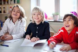 Classroom pictures with students drawing. Portrait Of Smiling Students In Drawing Class Stockphoto