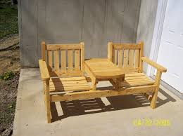 I gave the chairs two or three coats of oil (after a light sanding) in the spring and they've come up beautifully. Two Seat Garden Bench By Steveosshop Lumberjocks Com Woodworking Community