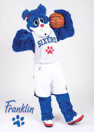 The philadelphia 76ers today introduced their new team mascot, franklin, at the franklin institute in philadelphia, where more than 300 area children welcomed sixers fan's best friend. The 76ers New Mascot Is A Blue Dog Named Franklin For The Win