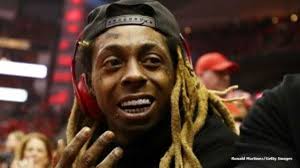 Milwaukee furniture maker created green and gold sofa for rapper Lil Wayne,  a Packers fan since childhood