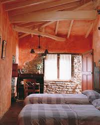 Loft room decorating ideas, like the one in the picture above, can end up with a very modern living room with a contemporary fireplace, sofa, white chair and white painted timber rafter ceiling in what was previously a waste of space in the attic. 70 Cool Attic Bedroom Design Ideas Shelterness