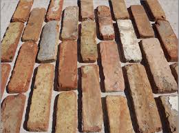 Old chicago reclaimed bricks are especially unique with color hues of creams and pinks with the occasional black, and many will feature the distinctive union diamond stamp on the face. Chicago Brick Veneer Chicago Brick Tile Chicago Brick Pavers