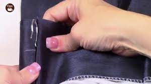 3.after you put the prong into the pocket, the result is a clean hook on the back and a triple pinch pleat on the front. How To Use Dritz Pin On Drapery Hooks Youtube