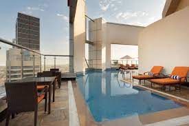 The Top Amenities Of Ramada Abu Dhabi Corniche Include A Rooftop Pool That Gives Breathtaking View Of The City Luxury Hotel Top 10 Hotels Hotel