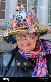 The Mall, London, UK. 3rd May 2023. Royal fan, Donna Werner, who has  travelled from the USA, created a detailed Coronation hat by hand ahead of  the State Coronation of His Majesty