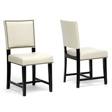 To enhance the look of your dining room, you can match your paintings, cutlery, decorative items and ornaments and rugs to your dining furniture set. White Leather Dining Chair