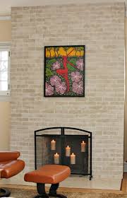 You don't need to replace the bricks; Painted Brick Fireplace Makeover