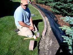 Flower bed edging is a landscape detail that can really make a difference in the look and presentation of your garden. How To Install A Paving Stone Border Youtube