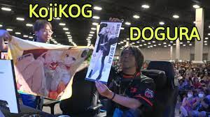 Street Fighter Pros Show Off Their Hololive Oshis on Stage at EVO 2023 [ KojiKOG vs Dogura] - YouTube