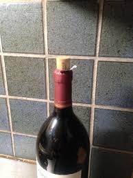 Point the bottle away from people, just in case wine sprays out. Wine Bottle Slightly Uncorked Itself After Left In Hot Car Mildlyinteresting