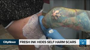 Flower tattoo by jack marsh. Calgary Tattoo Artist Gives Fresh Ink To Cover Cutting Scars
