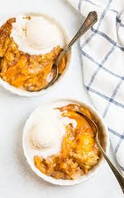 This peach cobbler recipe is a new favorite with it's spiced peach filling and sweet biscuit top. Dutch Oven Peach Cobbler Oven Or Campfire Recipe