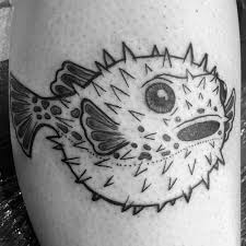 Draw the puffer fish's body by making most of a very round circle. Tribal Puffer Fish Tattoo Novocom Top