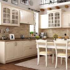 Appliances such as refrigerators, dishwashers, and ovens are often integrated into kitchen cabinetry. China Modern Design High End Kitchen Cabinets With Clean Handle Less Look Double Sink China Kitchen Cabinets Kitchen Cabinet Designs