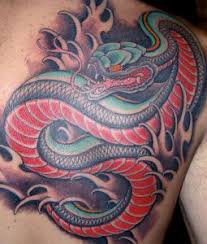 The combination of beautiful colors makes it look more shining and edgy. 80 Japanese Snake Tattoos Myths Symbolism Common Themes