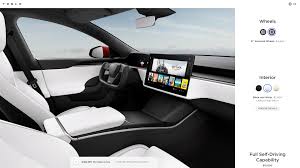 Tesla's model x and model s (image: Tesla Reveals Redesigned Model S And X With New Interiors And A Silly K I T T Style Steering Wheel Carscoops