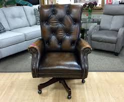 Just In The Door Brown Leather Executive Office Chair That S Adjustable Wheeled Leather Dining Room Chairs Executive Office Chairs Dining Room Chair Cushions