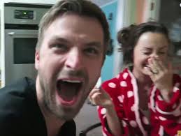 Giddy husband shocks wife with pregnancy news