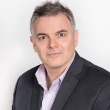 Two Big Law Firms Sue Trump as Third Settles to Avoid Order (4)