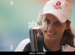 Christine Brinker Deutschlands lächelt während der WomenÒs Skeet  Qualifikation Wettbewerb bei der 2008 Olympischen Spielen in Peking,  Peking, China, 14. August 2008. Foto: Marcus Brandt Dpa (c) Dpa