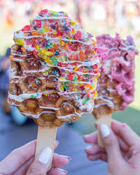 Waffle Pops Are A New Trendy Dessert Covered In Tasty Toppings Waffle Pops Coachella Food Cute Desserts