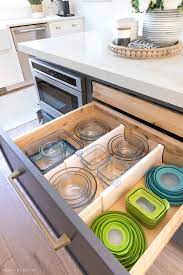 The first mistake people make with cabinets is organizing inside the lines of shelving. 8 Budget Friendly Kitchen Organization Ideas Driven By Decor