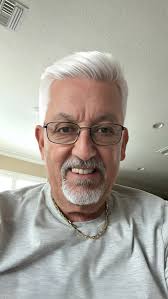 Looking to see if I should shave my head. Wonder what it would look like.