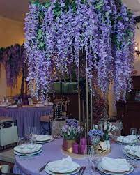 Wisteria is a symbol of love and happiness. Wisteria Flower Wedding Centerpiece Tall Wedding Vases Tall Wedding Centerpieces Flower Centerpieces Wedding