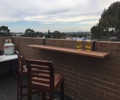 Hanging tables are great way to save space and it's the perfect conversation piece for any indoor or outdoor party. Hanging Balcony Bar Table 8 Steps With Pictures Instructables