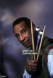 Photo of Max ROACH; studio, posed, with drum sticks News Photo