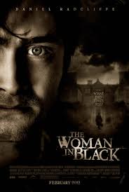 A seductive woman gets an innocent professor mixed up in murder. The Woman In Black 2012 Imdb